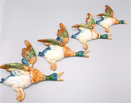 A graduated set of 4 Beswick mallard duck plaques